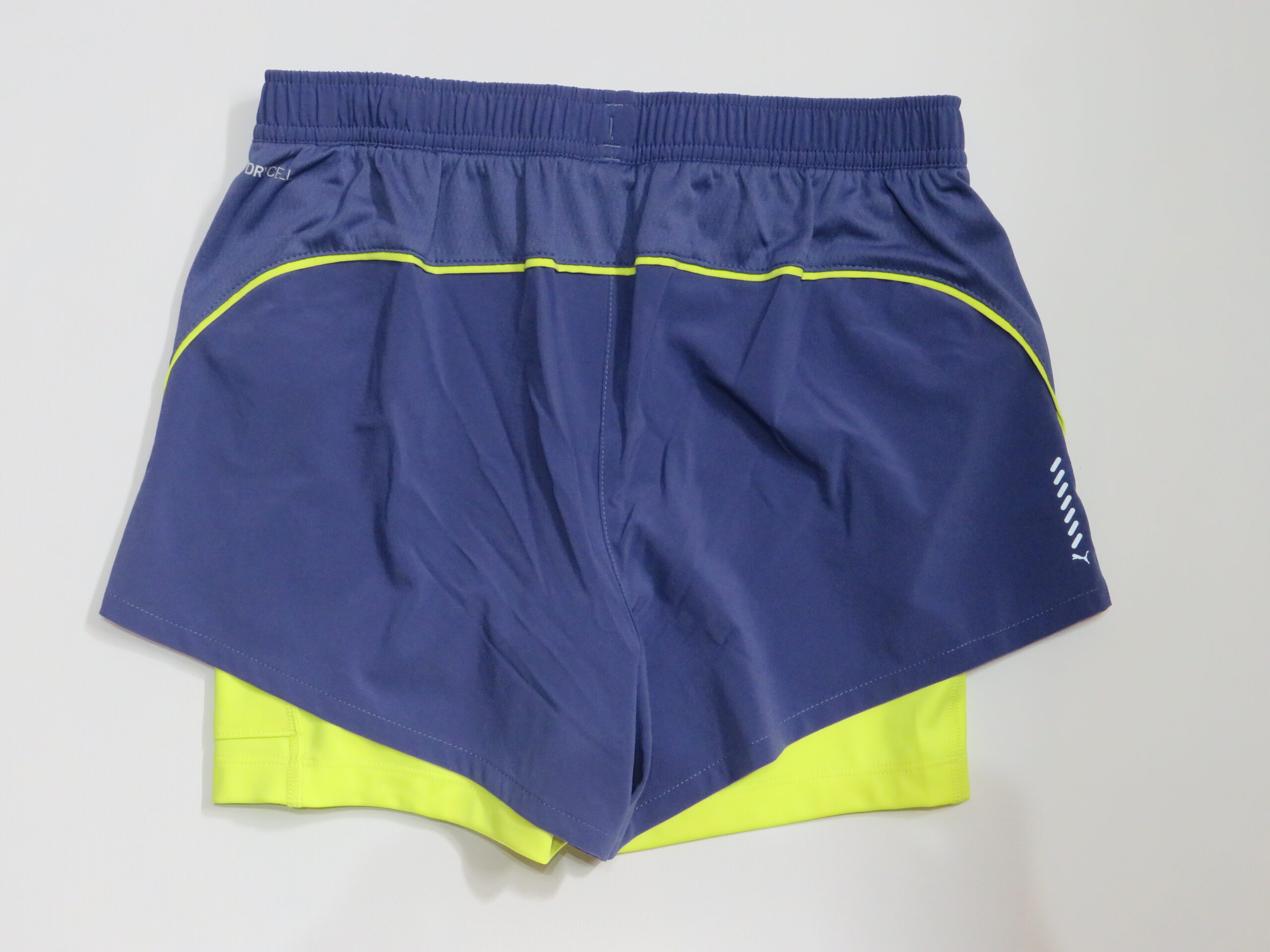 PANTALÓN CORTO CON MALLAS PUMA LILA-AMARILLO 2 PANTALÓN CORTO CON MALLAS PUMA LILA-AMARILLO - Imagen 2